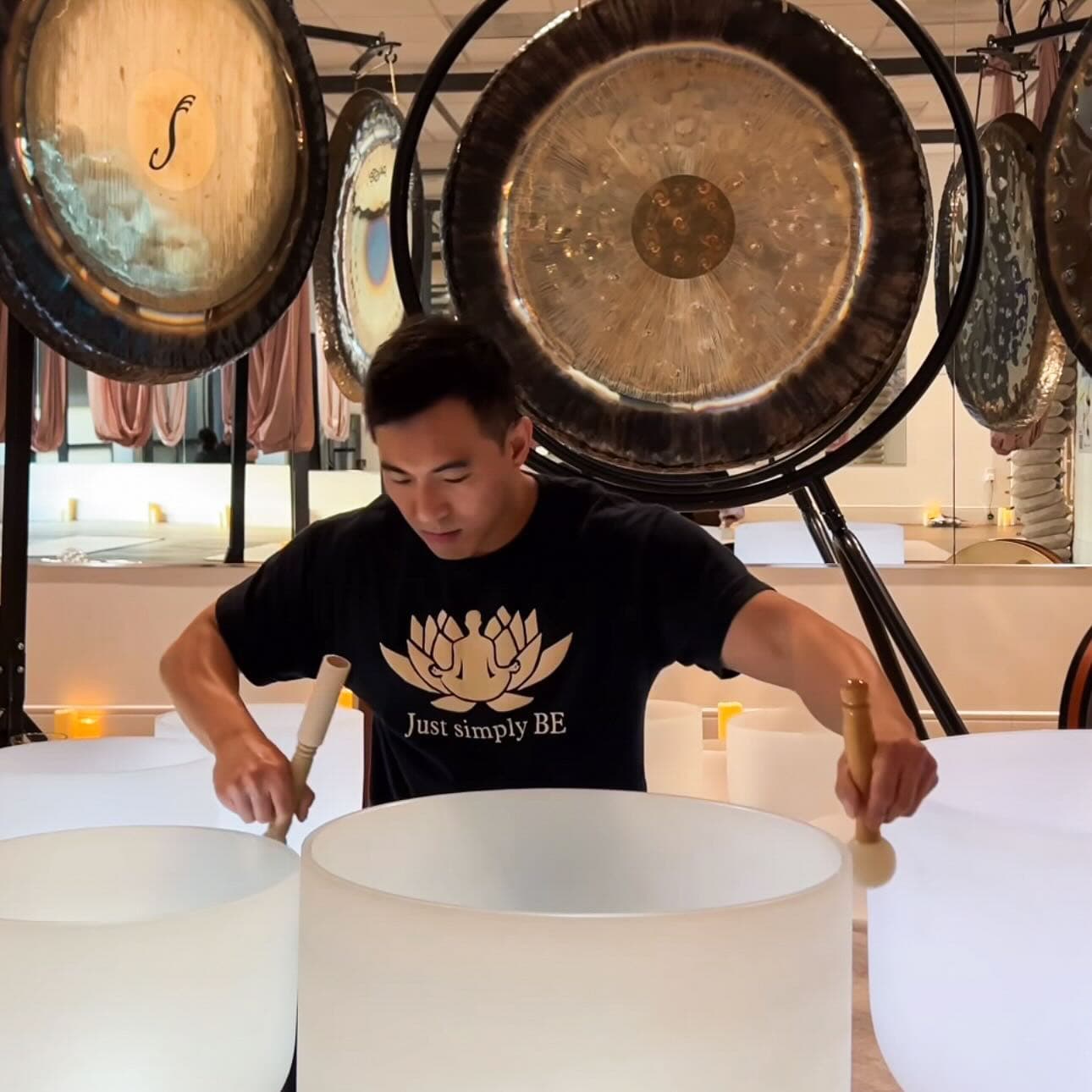 Kyle Lam leading a sound bath and training session
